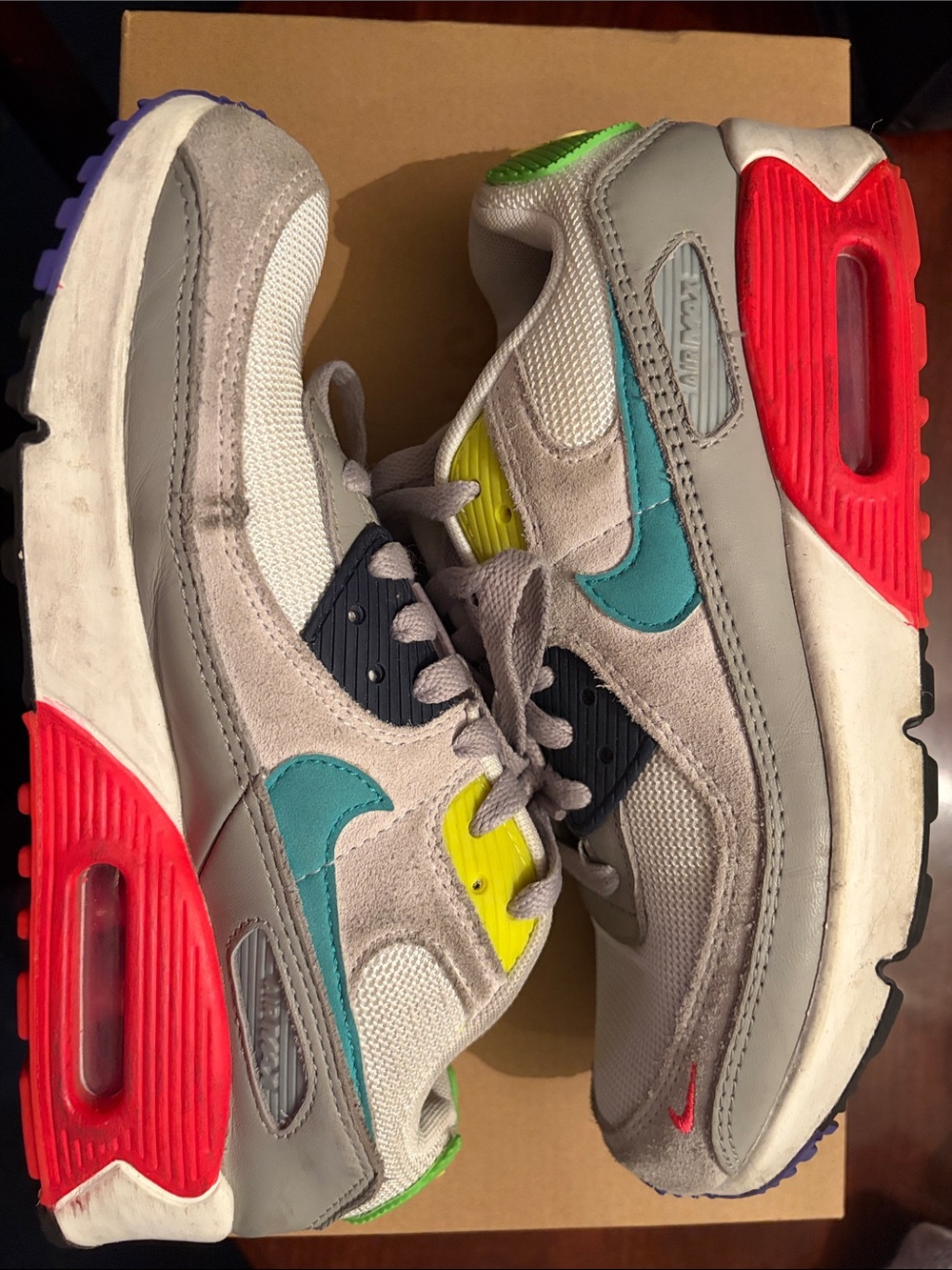 Nike Kids Gray Sneakers with Teal, Red and Yellow Accents